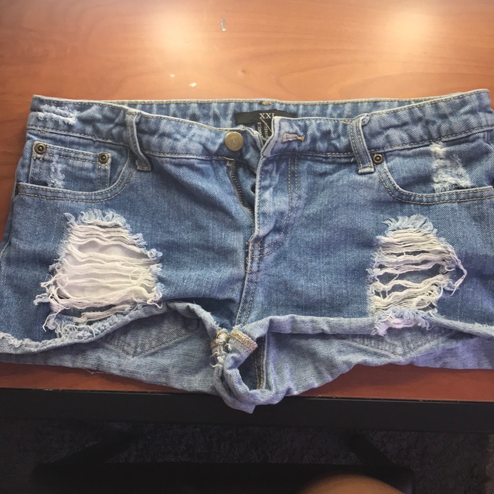 Distressed Light-washed jean shorts